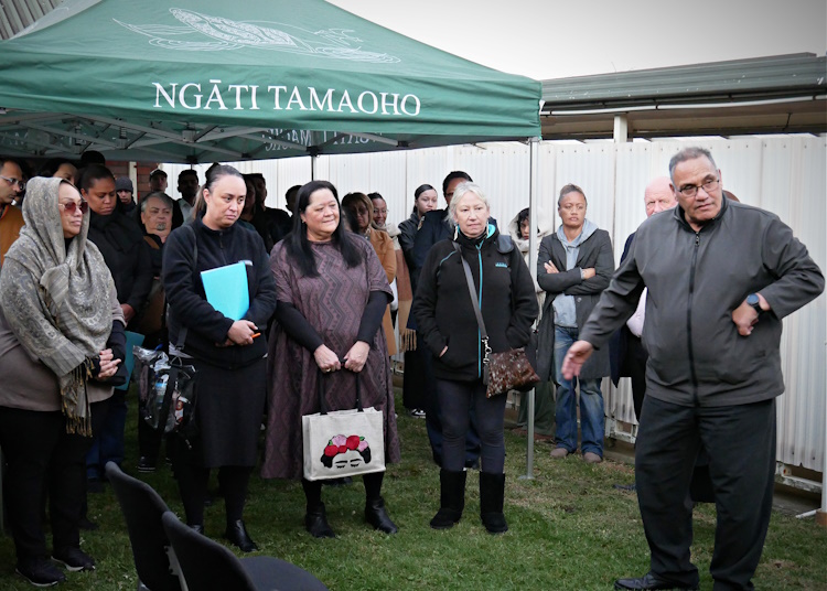 Toko Nathan (right front), Manukau Region Lead Adviser Māori Partnerships, welcomes visitors ahead of the pōwhiri at Ngāti Tamaoho Trust. Seated in front row (left to right): Morana Diamond, Maryann Moki, and Ali Rei.
